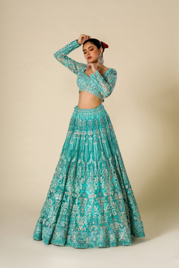 Aquamarine Crystal Spark Lehenga Choli With Embroidered Patterns and Beadwork Paired With Net Dupatta