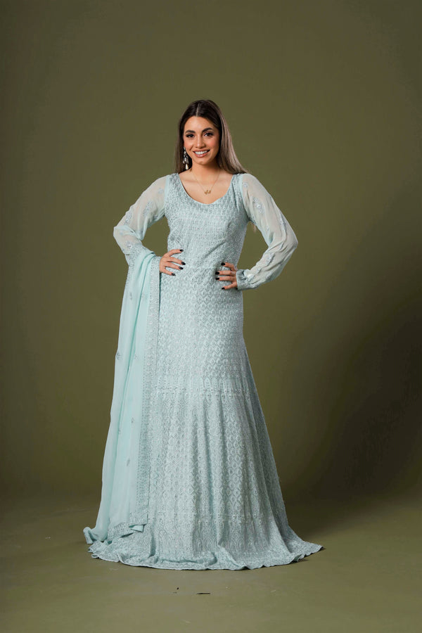 Aquamarine Dazzle Gown With Beadwork and Stones With Carved Embroidery Alongwith Bordered Dupatta