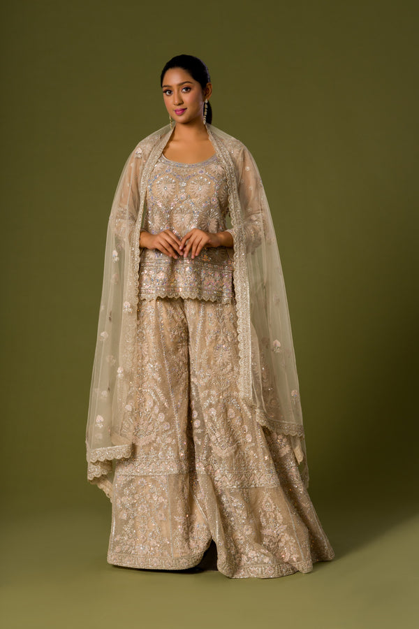 Vanilla Almond Delight Palazzo Suit With Cut Dana and Aari Beadwork Paired With Bordered Net Dupatta