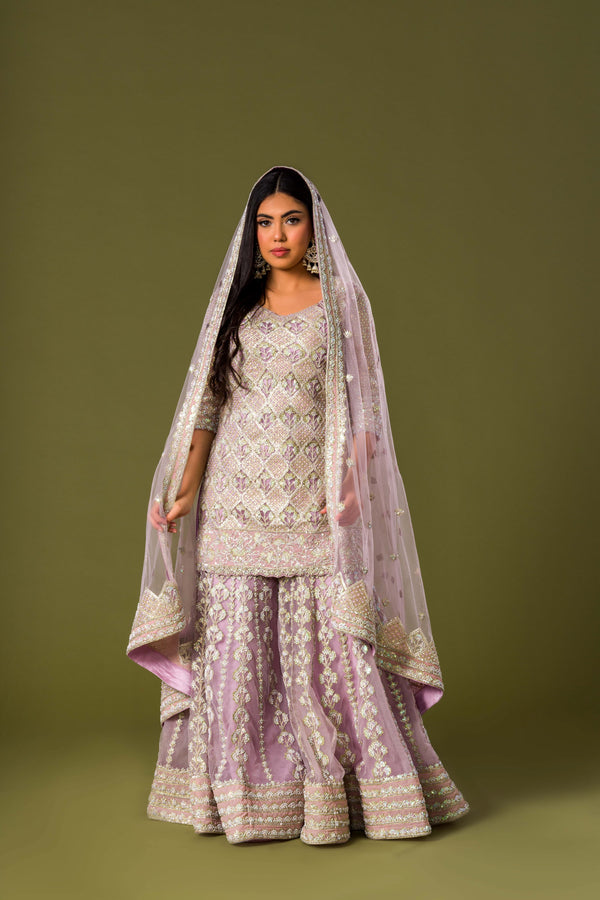 Subtle Lavender Touch Palazzo Suit With Tilla Work Finished With Giant Beads And Net Gauzy Dupatta