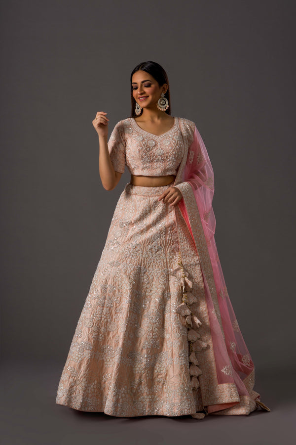 Hot Peach Ecstasy Lehenga Choli with Sugar Beadwork and Silver Sequins Alongwith Baby Pink Net Dupatta