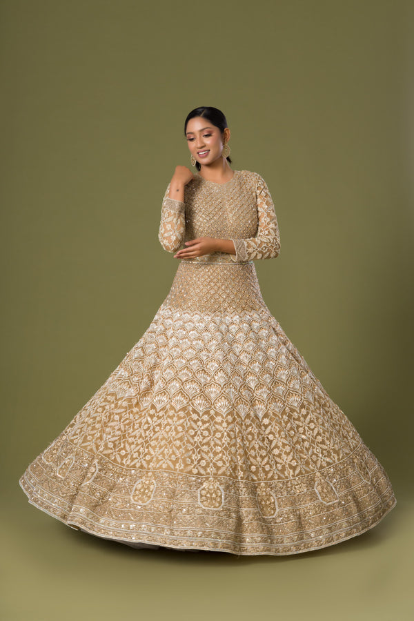 Mellow Sunbeam Gown Containing Cut Dana on Top and Flare Borders Alongwith Zari Embroidery On Sleeves