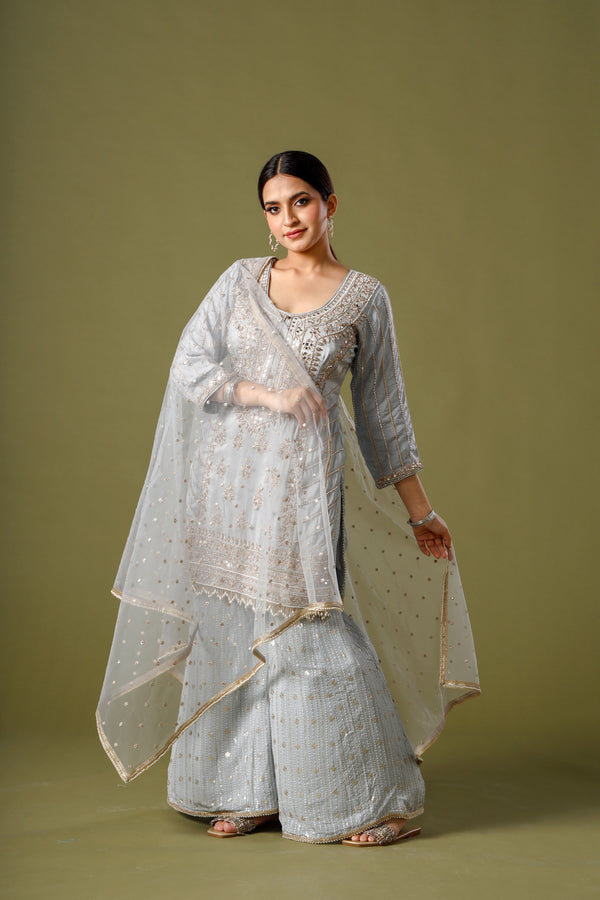 Ethereal Ash Grey Haze Sharara Suit With Mirror and Tillawork Paired With Sequins Palazzo and Net Dupatta