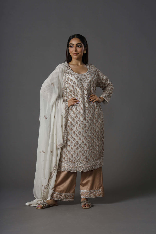 Heavenly Shadows Salwar Kameez With Cut Dana Shirt and Bottom Hems Paired With Bordered Dupatta