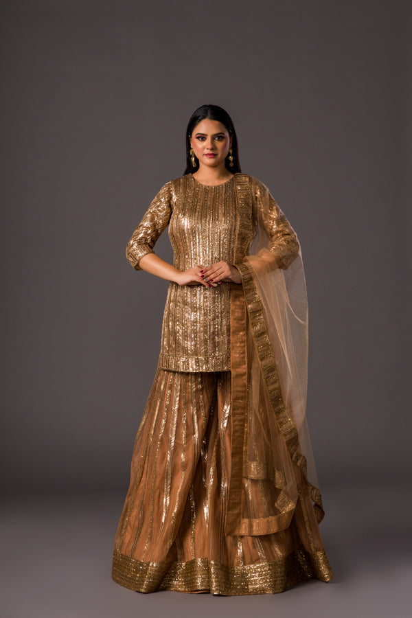 Mesmerizing Golden Glow Palazzo Suit With Aari Beads and Gota Containing Bordered Soft Net Dupatta