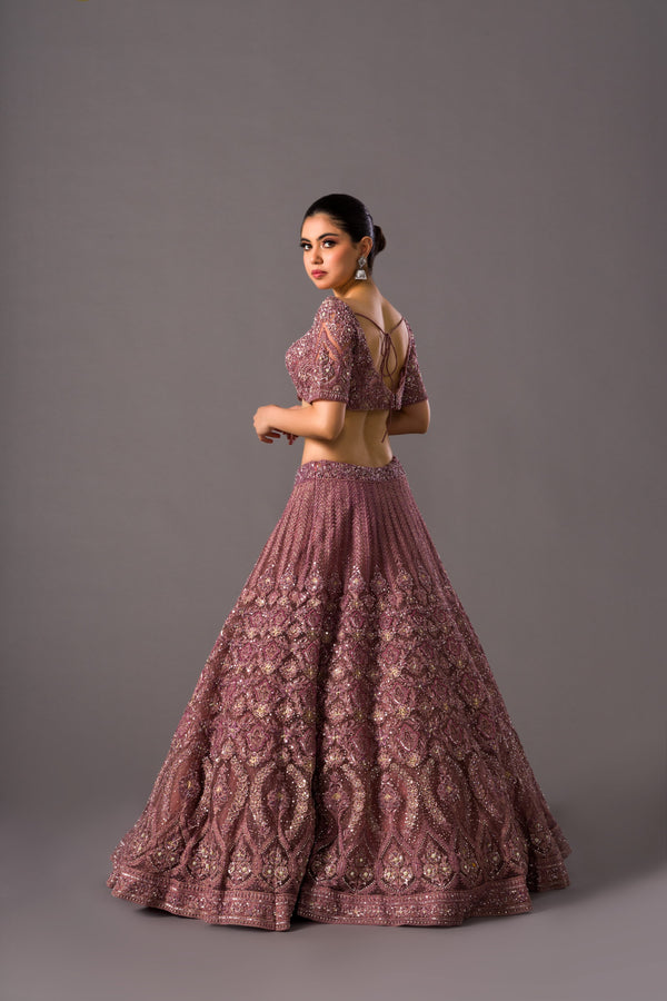 Timeless Antique Rose Bridal Lehnga With White Beading and Sequins Paired With Net Dupatta