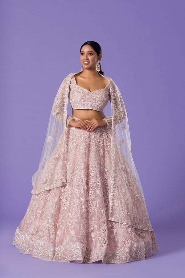 Sun-Kissed Baby Pink Lehenga Choli With Tilla Work and Zari Motif Finished With Silver Beading
